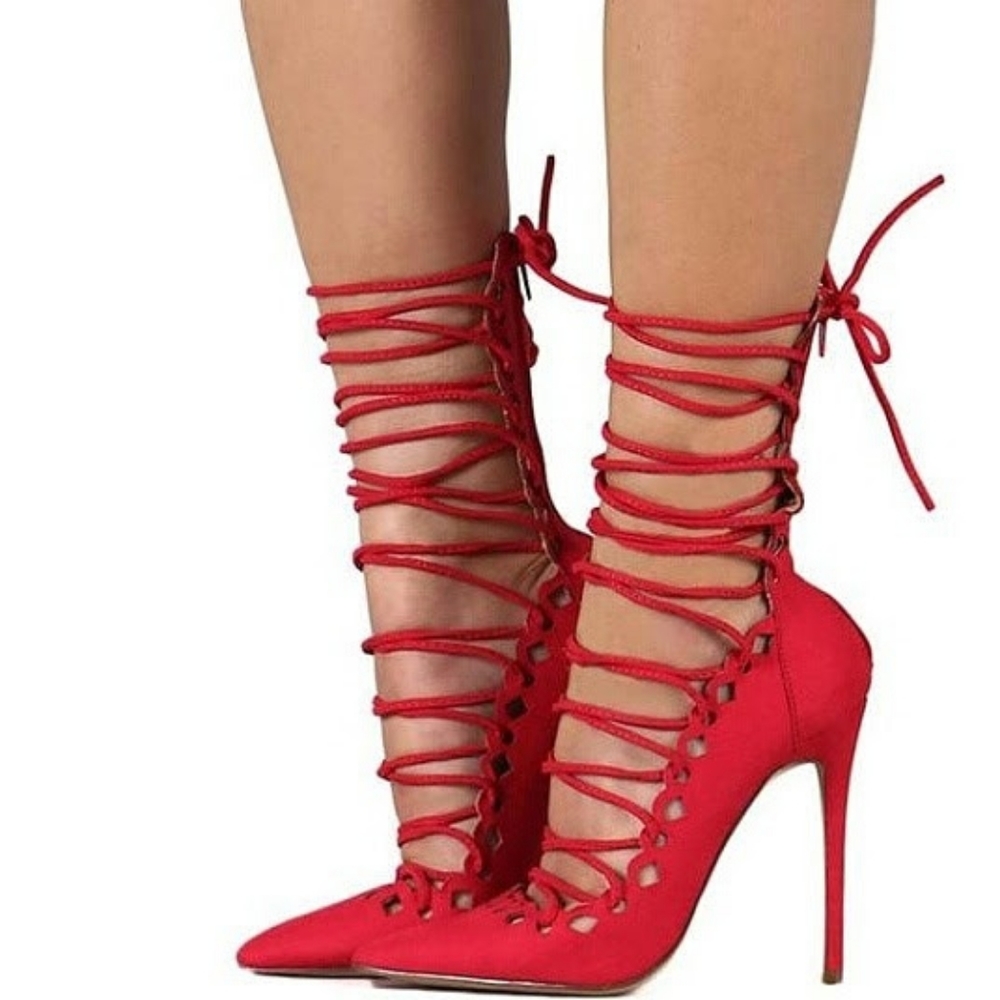 Sexy strappy high heals. Red high heel.